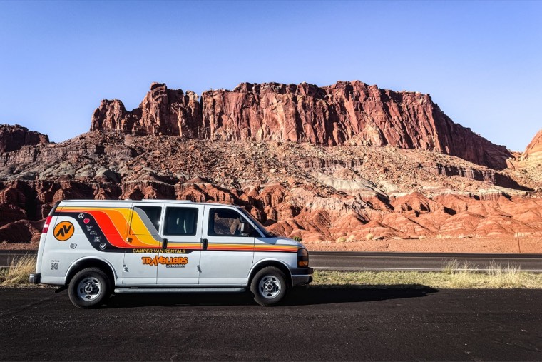 Travellers Autobarn campervan parked on an open US road trip route